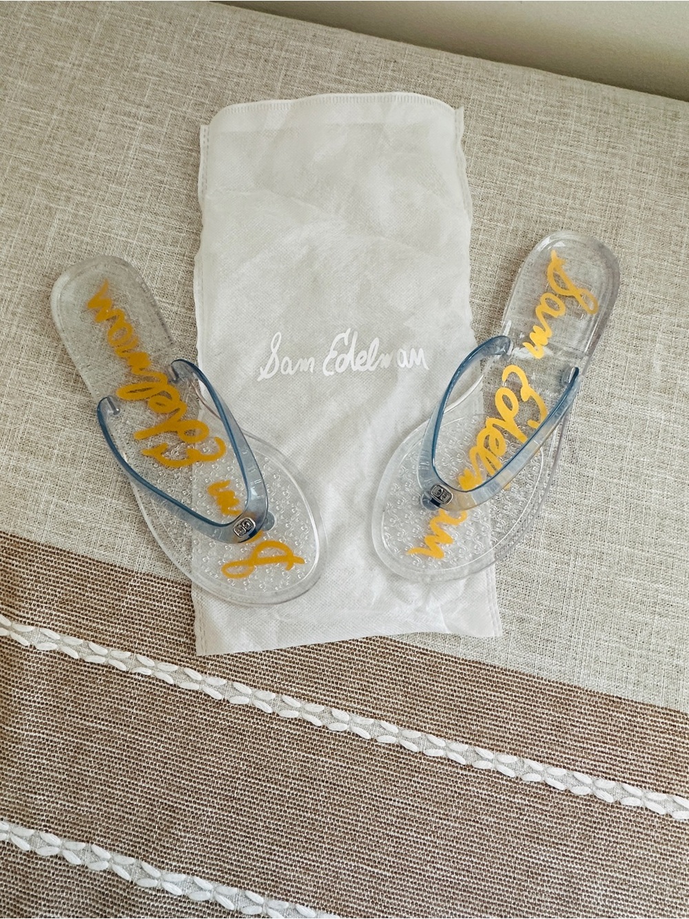 Sam Edelman Clear Jelly Flip Flops with Blue Straps and Gold Script